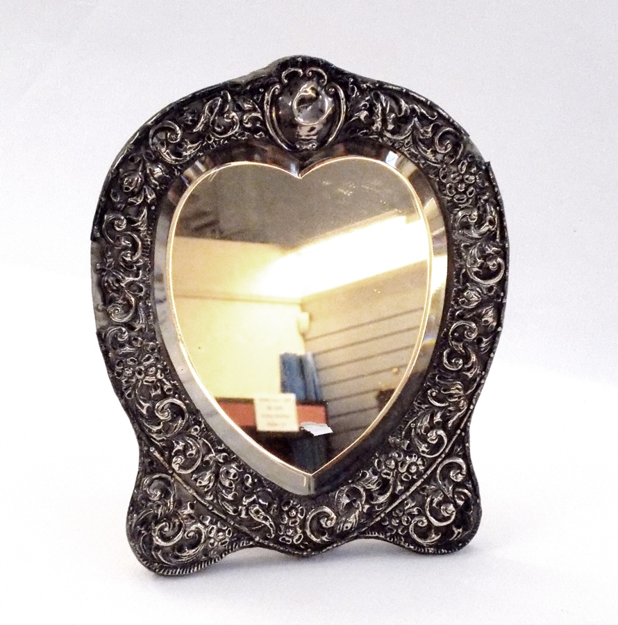 Victorian silver heart-shaped bevelled table mirror with foliate scrollwork design, Birmingham 1898,