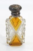 Silver-mounted, amber flashed and cut glass scent bottle having scroll repousse silver hinged top,