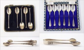 Two silver sugar nips, set of six silver coffee spoons,