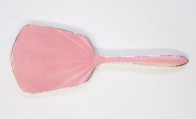 Silver mounted hand mirror with pink enamelled back,