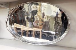 Silver plated oval tray with gadrooned wavy rim border to lobed lattice galleried side,