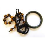 Tiger's eye bead necklace and dark green jade bangle