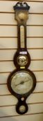 Early 19th century rosewood wheel barometer with swan neck pediment, dry/damp dial and thermometer,