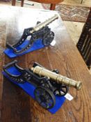 Pair brass and cast iron model cannons,