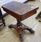 Early 19th century rosewood card table with foldover swivel top,