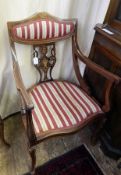 Edwardian inlaid rosewood salon suite comprising four standard, two armchairs and two-seater settee,