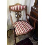 Edwardian inlaid rosewood salon suite comprising four standard, two armchairs and two-seater settee,