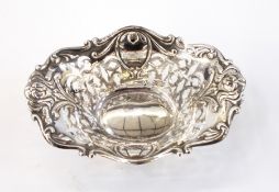 Edwardian silver bonbon dish, oval and pierced, having rococo repousse work, Birmingham 1909,