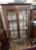 Edwardian mahogany china display cabinet having raised ledge back,