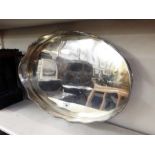 Silver plated oval tray with gadrooned wavy rim and straight sided half-galleried,