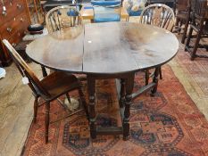 18th century oak oval top gateleg dining table, with a frieze drawer,