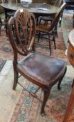 Pair of Hepplewhite style mahogany dining chairs, each with shield shaped back, padded seat,