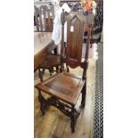 Pair 17th century oak high back dining chairs, each with Prince of Wales feather cresting,