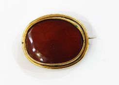 Late Victorian gold-coloured metal and cornelian brooch
