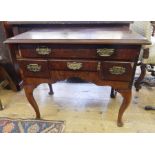 Reproduction 18th century style mahogany lowboy having an arrangement of five drawers,