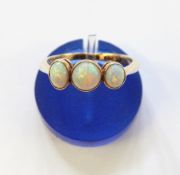 18ct gold three-stone opal ring with raised collar setting