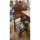 Pair 17th century oak railback dining chairs, each having scroll cresting,