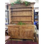 Antique pine dresser, with  shelves, two drawers and two cupboards,