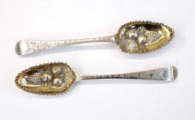 Pair of Georgian silver 'berry' pattern tablespoons with foliate bright-cut engraving, London 1779,