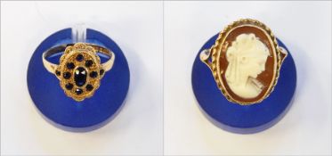 9ct gold and sapphire ring set with one centre oval,