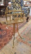 Edwardian mahogany and brass music stand with wooden base,