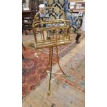 Edwardian mahogany and brass music stand with wooden base,