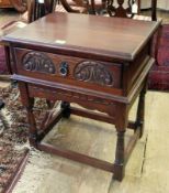 Old Charm "Tudor" side table with lunette carved front and on baluster supports,