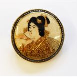 Japanese Satsuma pottery brooch depicting head and shoulders of a geisha