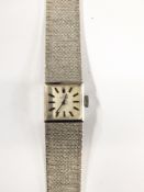 Lady's 18ct white gold Omega wristwatch with square dial,