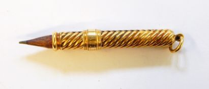 Gold-coloured metal spirally wrythen propelling pencil with engraved collar