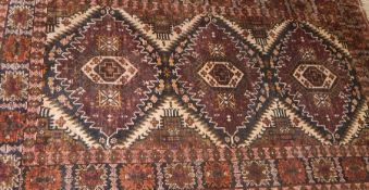 Caucasian style wool rug with triple lozenge totem, harshang borders,