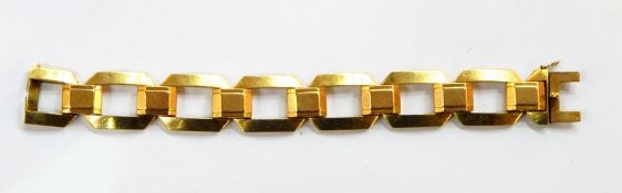 French gold-coloured metal bracelet in the form of angular pierced, rectangular links, 41.7g approx.