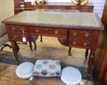 Late 19th century writing table with leather inset top, four flanking drawers and one frieze drawer,