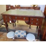 Late 19th century writing table with leather inset top, four flanking drawers and one frieze drawer,