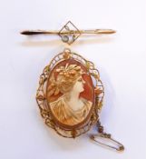 Oval cameo brooch with pierced decorative gold-coloured metal surround and bar brooch with central