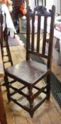 Pair 17th century oak railback dining chairs, each with carved scroll cresting,