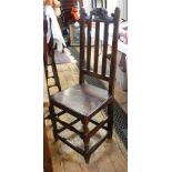 Pair 17th century oak railback dining chairs, each with carved scroll cresting,