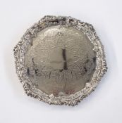 Late Victorian silver card tray, circular with raised C-scroll foliate embossed border,