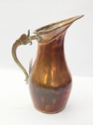 Old copper ewer with pointed spout, flattened dolphin handle, 32cm high, leather swagger stick,