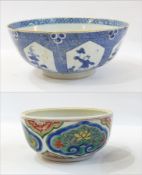 18th century Chinese blue and white bowl decorated with panels of boy holding flower and trees (af)