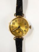 Lady's 1920's/30's Arcadia gold wristwatch with circular dial, Arabic numerals, luminous hands,