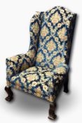 Late 17th/early 18th century Dutch wing armchair with high domed back, outscroll arms,