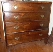 A mahogany straight front chest of four drawers with bracket feet,