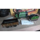 A tinplate Hornby type 101 green painted locomotive, the sides emblazonned with LNER 460; a