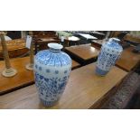 A pair of large Chinese vases with floral patterns