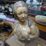 A terracotta bust of classical maiden