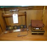 A miscellaneous collection, Tantalus holder, toleware box, napkin rings and others