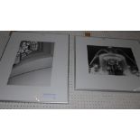 A pair of framed black and white photographs the first one depicting a waterfall the other depicting