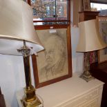 A brass Corinthian column form table lamp and a similar