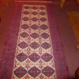A fine North East Persian Zabir Belouch rug 230 cm x 110 cm repeating panel motifs on an ivory field